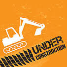 backhoe under construction sign